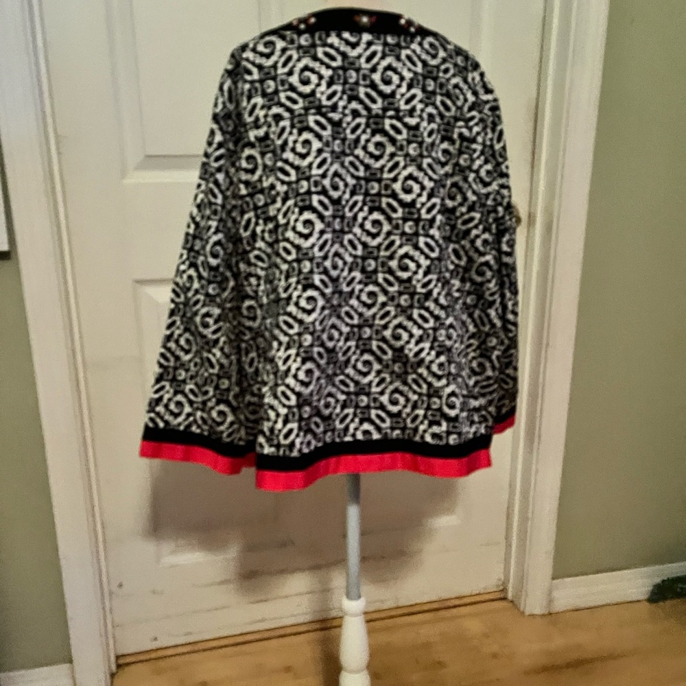 Ruby Rd jacket. Black & white trimmed in red. Buttons sewen around collar.